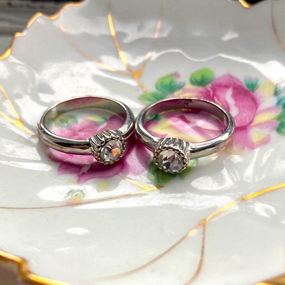 Set of two costume jewelry silver toned rings with rhinestone